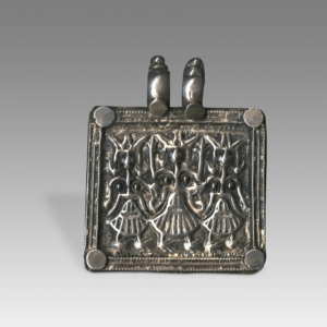 Plaque Amulet Depicting Hoi Mata