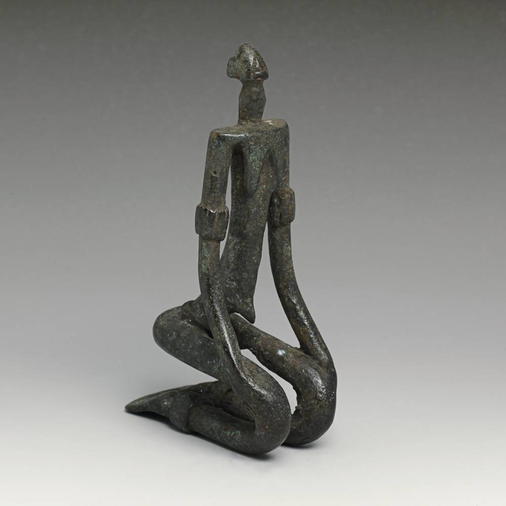 Senufo Iron Kneeling Figure