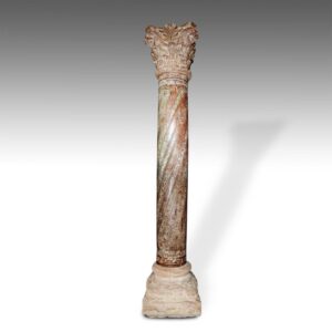 Indian Carved Pillar with Animal Faces on Capitol: Stone Base