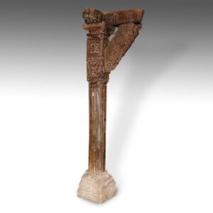 Indian Carved Pillar with "Tree of Life" Motif: Cross Top Cantilevered Capitol and Stone Base