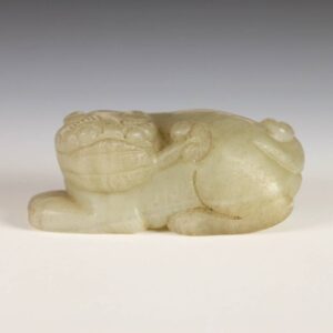 Chinese Toggle Depicting Mythological Lion with Ruyi