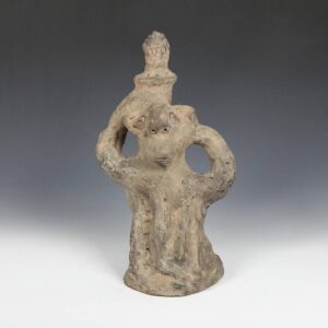 Koma Excavated Figure with Arms Raised Holding Basket on Head
