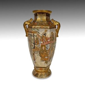Japanese Satsuma Octagonal Vase with Dragon Handles and Adorned with Monks