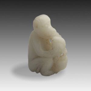 Chinese Toggle Depicting Monkey Enjoying Fruit